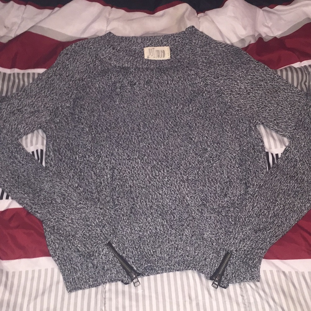 Holiday sweater with holes/zippers